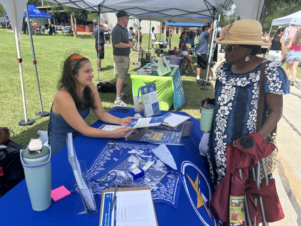 Members of the 290 Extension project team meet with the community at a booth at Elgin Western Days in June 2026.