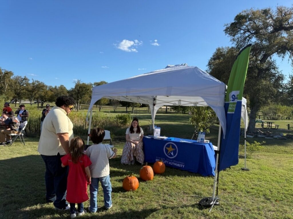 The 290 Extension Project Team meets with community members at the Great Pumpkin Bash in Elgin on October 11, 2026.